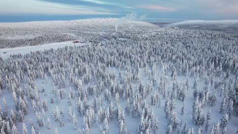 Drone-Landscape-Pan-Of-Vast-Snow-covered-Landscape-in-Lapland,-Finland,-Arctic-Circle