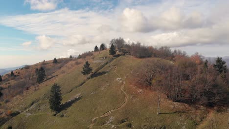 aerial-view-of-1st-world-war-mountain-battlefield-Kolovrat-in-Slovenia,-drone-flying-forward