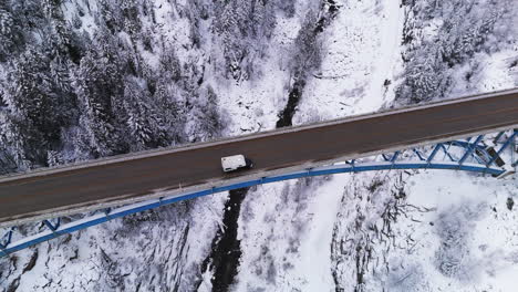 Kootenay-Majesty:-Aerial-View-of-Paulson-Bridge-in-Snowy-Wonderland