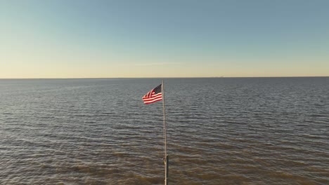 Drone-view-of-the-American-flag-near-the-American-legion-in-Fairhope-Alabama