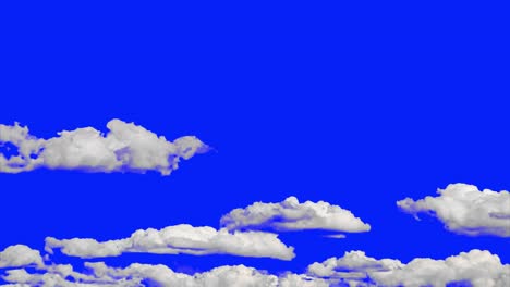 White-clouds-moving-viewed-from-below-with-blue-background