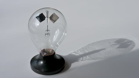 Crookes-radiometer-slows-to-a-stop-evoquing-the-loss-of-renewable-energy