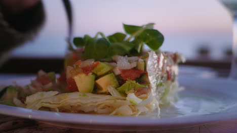 Close-up-Shot-of-Avocado-Salad-At-Outdoor-Restaurant