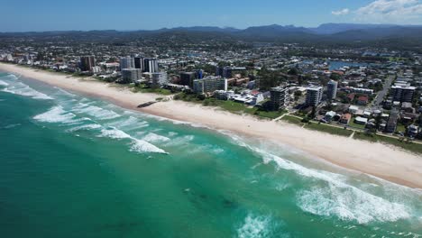 Palm-Beach-With-Canals-In-Distance---Southern-Gold-Coast,-Queensland,-QLD---Australia---Drone-Shot