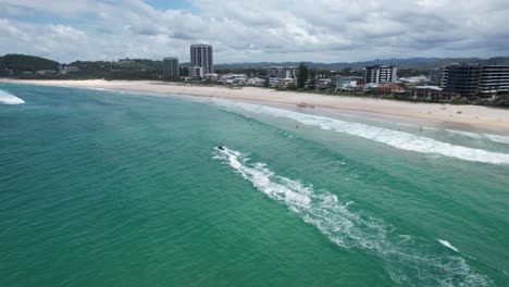 Jet-Ski-On-A-Perfect-Day-In-Palm-Beach---Gold-Coast---Queensland-QLD---Australia---Drone-Shot