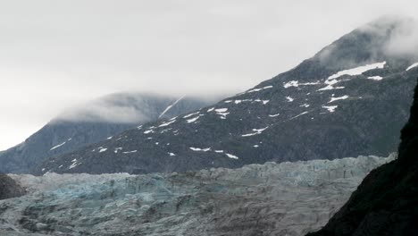 Mendenhall-Glacier-and-the-surrounding-mountains-covered-with-clouds,-Alaska