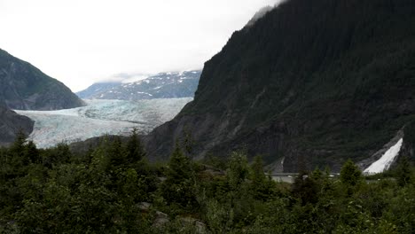 Mendenhall-Glacier-and-Nugget-Falls,-in-a-cloudy-day,-Alaska