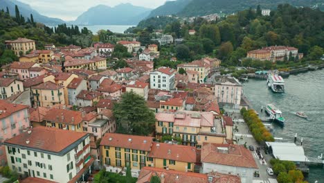 AERIAL:-Bellagio-is-known-for-its-cobbled-lanes,-elegant-buildings-and-Villa-Serbelloni-Park