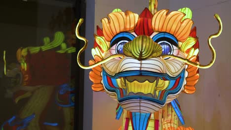 View-of-a-dragon-lantern-installation-illuminated-outside-the-China-Cultural-Centre-commemorating-the-upcoming-Chinese-Lunar-New-Year-2024,-the-Year-of-the-Dragon-in-Spain