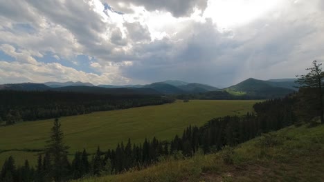 Time-lapse-of-a-summer-thunderstorm-blowing-into-a-lush-and-scenic-valley-in-the-Rocky-mountain-region-of-southern-Alberta