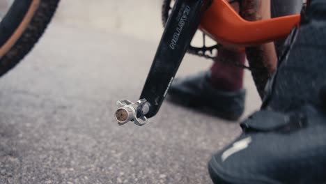 bicycle-rider-clips-his-shoe-into-the-pedal