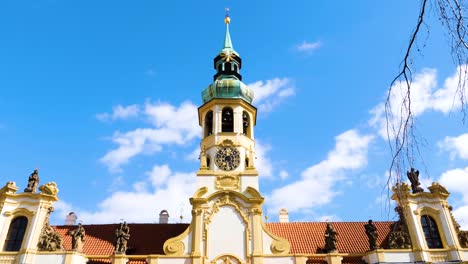 Beautiful-Clock-and-Bell-Tower-of-Loreta-Monastery-in-Prague,-Czech-Republic