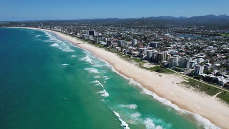 Waves-Gently-Breaking-In-Palm-Beach---Gold-Coast---Queensland-QLD---Australia---Drone-Shot