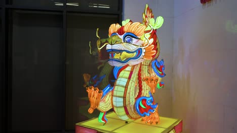 A-dragon-lantern-installation-illuminated-outside-the-China-Cultural-Centre-commemorating-the-upcoming-Chinese-Lunar-New-Year-2024,-the-Year-of-the-Dragon-in-Spain