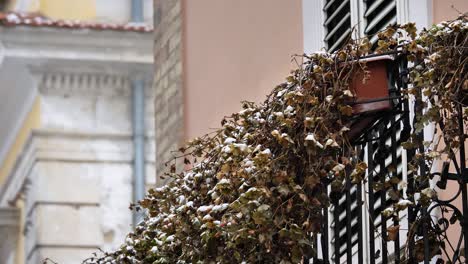 Snow-on-the-balcony-of-a-house-in-Guardiagrele,-Abruzzo,-Italy
