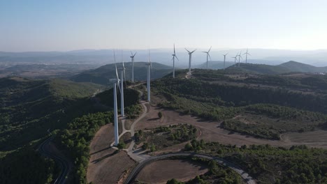 Drone-shot-of-a-wind-farm-for-eolic-energy-production-in-Catalonia,-Spain