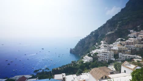 Overlooking-City-Countryside-From-Fence-Near-Cliff-|-Positano-Italy-Scenic-Summer-Cliffside-Immersive-Travel-Tourism-Mountainside,-Europe,-Walking,-Shaky,-4K