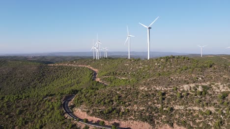 Drone-shot-of-a-wind-farm-for-eolic-energy-production-in-Catalonia,-Spain