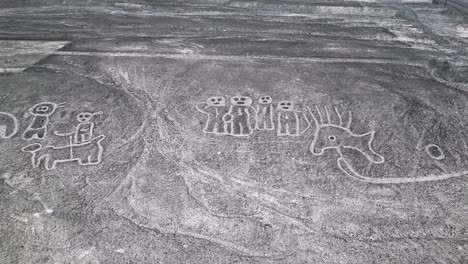 Aerial-panorama-view-of-mysterious-humnoid-creatures-in-the-Peruvian-desert-in-Nazca