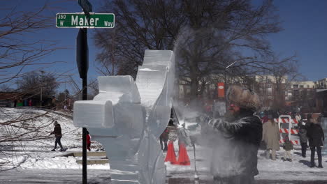 Ice-sculptor-crafting-ice-sculptures-in-slow-motion-detail
