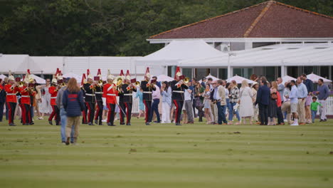 The-Household-Cavalry-Band-march-in-slow-motion-on-the-guards-polo-club-field