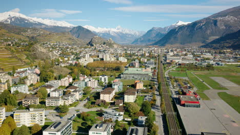 Railway-Line-In-The-Town-Of-Sion-Near-Airport-In-Sunny-Autumn