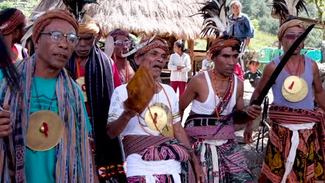 Community-elders-wearing-traditional-tais-attire-during-a-cultural-welcome-ceremony-performance-in-the-remote-districts-of-Timor-Leste-in-Southeast-Asia