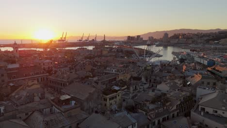 Sunset-over-Genoa's-historic-center-with-bustling-port-and-cityscape