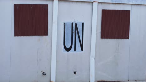 United-Nations-on-an-old-shipping-container-in-the-capital-city-of-East-Timor,-Southeast-Asia