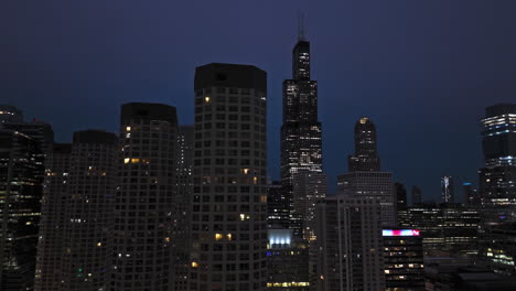 Aerial-view-around-the-Presidential-Towers-with-Willis-building-background,-dusk-in-Chicago