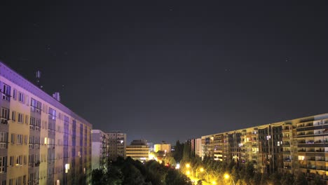 Berlin-Night-Sky-Timelapse-with-Moving-Stars-above-Illuminated-City