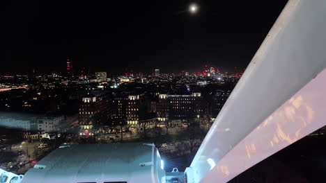 London,-England---12-29-2023:-Mesmerizing-Night-Views:-Ferris-Wheel-Perspective