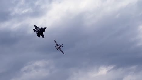 Airshow--Jet-and-Prop-plane-fly-close-in-formation--Heritage-Flight
