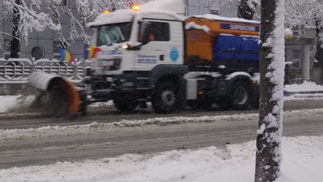 Snow-Removal-Machine-On-The-Streets-On-A-Snowy-Day