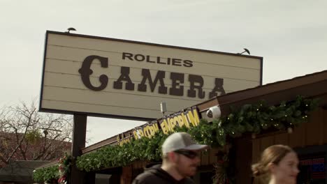 Rollies-camera-shop-sign-in-downtown-Sedona,-Arizona