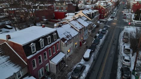 Snow-covered-roof-of-homes-in-american-town-on-winter-day