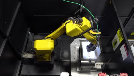automated-welding-machine-operating-within-a-factory-setting
