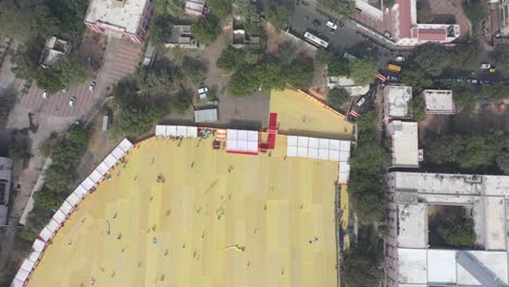 rajkot-kite-festival-aerial-drone-view-camera-is-moving-forward-where-many-people-are-watching-big-big-kite-and-enjoying