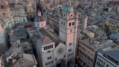 Aerial-shot-of-Genoa's-historic-architecture-during-golden-hour,-soft-light-enhancing-details