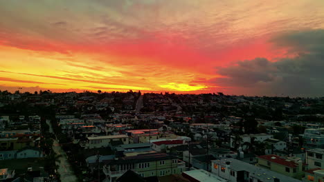 Fiery-sunset-sky-over-Manhattan-Beach-neighborhood,-California
