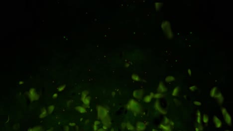 Realistic-fire-gas-with-hot-fiery-embers-sparks-flames-3D-animation-particle-glow-burning-on-black-background-vfx-green