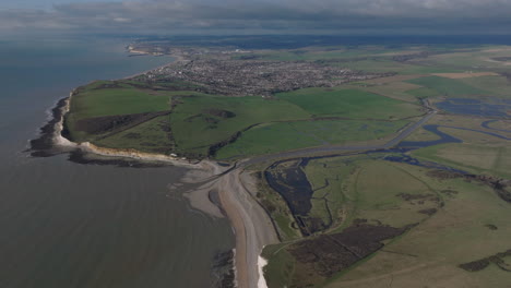 Aerial-shot-over-cuckmere-haven-and-seaford-town
