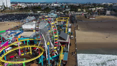 Aerial-view-around-the-Pacific-Wheel-and-away-from-the-at-the-Santa-Monica-pier