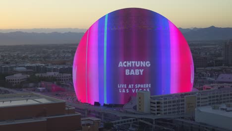 Illuminated-MSG-Sphere-Advertising-U2-Concert-During-Golden-Hour-In-Las-Vegas