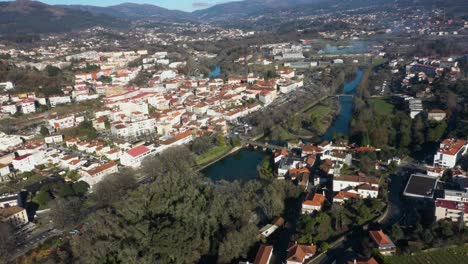 Bird's-eye-view-above-bridge-crossing-River-Vez-in-town-of-Arcos-de-Valdevez-Portugal