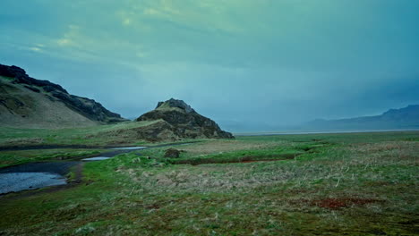 Panoramic-view-of-a-Icelandic-rugged-terrain-landscape-at-dusk