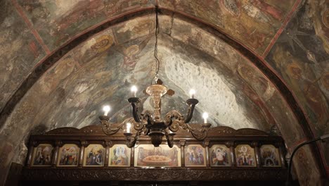 Greek-orthodox-church-interior-shot-shows-the-church-dome-and-chapel-with-beautiful-hagiography