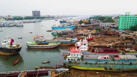 Aerial:-Large-dockyard-or-shipyard-beside-river-port-in-South-Asia,-Bangladesh