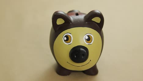 Homemade-piggy-bank-shape-of-bear-inspired-by-Masha-and-Bear-cartoons