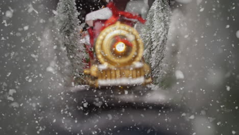 Polar-express-Christmas-train-in-snow-storm,-slow-motion